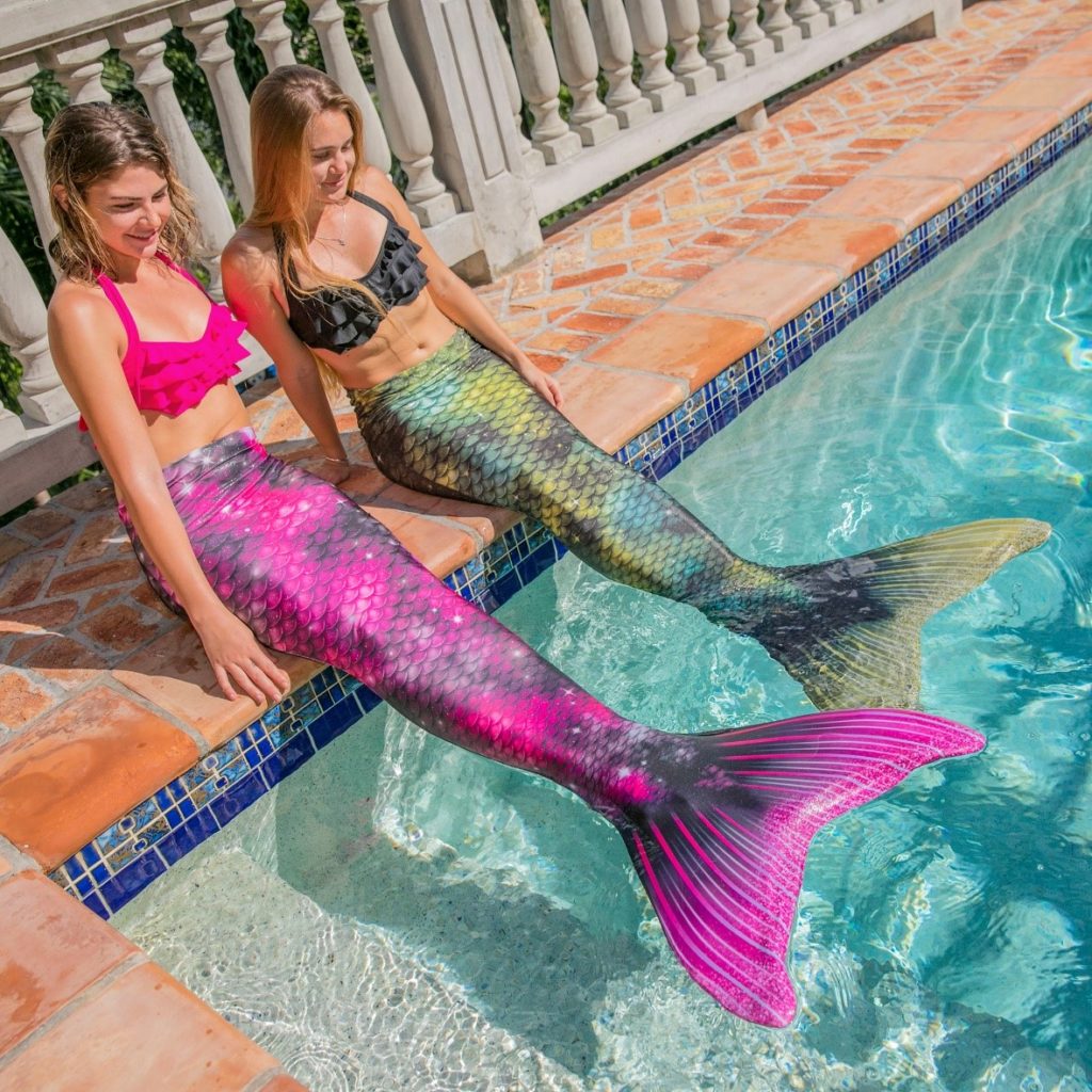 two girls in the Fin Fun Andromeda and Nebula Limited Edition mermaid tails