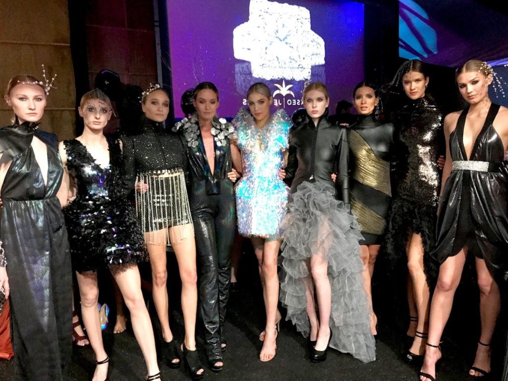 the lineup of models sporting Henderson's unique sea-themed high fashion apparel