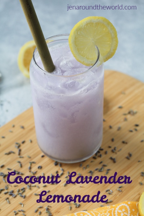 a refreshing lavendar drink with a lemon slice garnish