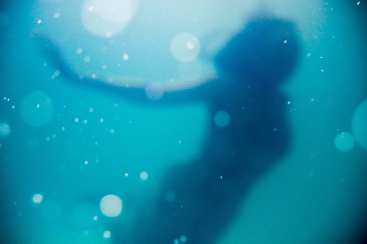 out of focus mermaid underwater
