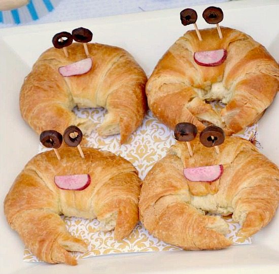 four croissants made to look like crabs