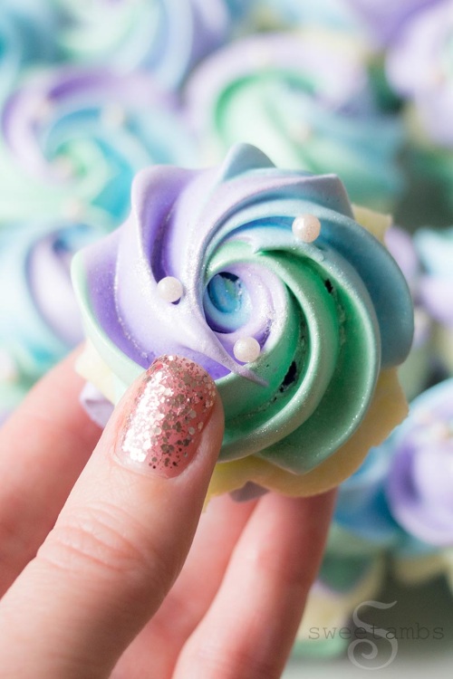 swirled mermaid meringue cookies with chocolate ganache and pearl sprinkles