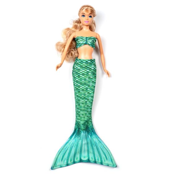a doll wearing a matching green scale mermaid tail and top on a white background